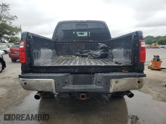 2012 Ford F-250 XL with VIN 1FT7W2B69CEB27556, listed as a Copart auction lot 62176985 with 171,669 mi miles and Salvage title. Bid and sale history available at DreamBid. Image 6.
