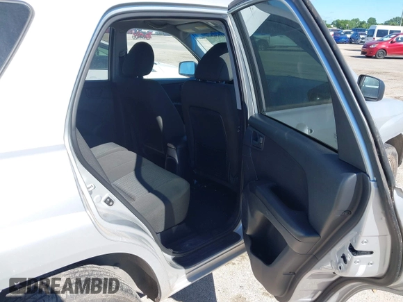 2009 Kia Sportage LX with VIN KNDJF724X97556574, listed as a IAAI auction lot 42206080 with 115,868 mi miles and . Bid and sale history available at carsss.com. Image 8.