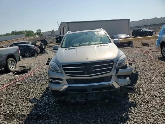 2014 Mercedes-Benz M 350 with VIN 4JGDA2EB4EA406865, listed as a Copart auction lot 61630045 with 142,616 mi miles and Salvage title. Bid and sale history available at DreamBid. Image 14.