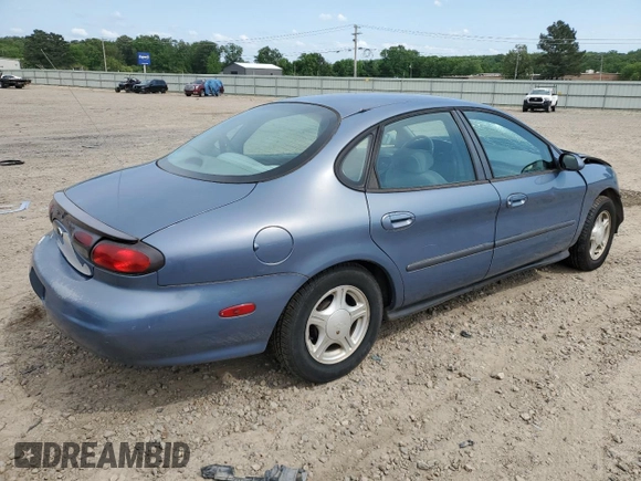 1999 Ford Taurus SE z VIN 1FAFP53U0XG322565, wystawiony jako Copart lot #54560285 z przebiegiem 164 300 mil mil oraz Szkoda całkowita • Salvage title. Historia ofert i sprzedaży dostępna na DreamBid. Obrazek 3.