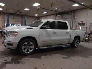 2019 Ram 1500 Big Horn/Lone Star with VIN 1C6SRFFT7KN645776, listed as a IAAI auction lot 41395240 with 136,068 mi miles. Bid and sale history available at carsss.com. Image 14.