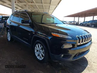 2015 Jeep Cherokee Latitude with VIN 1C4PJLCB8FW669150, listed as a IAAI auction lot 42122669 with 194,525 mi miles and . Bid and sale history available at DreamBid. Image 1.