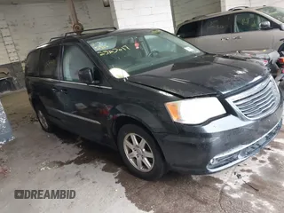 2011 Chrysler Town & Country Touring with VIN 2A4RR5DGXBR745293, listed as a IAAI auction lot 41862089 with 999,999 mi miles. Bid and sale history available at carsss.com. Image 1.