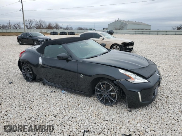 2014 Nissan 370Z Touring with VIN JN1AZ4FH1EM620177, listed as a Copart auction lot 42581255 with 106,957 mi miles and Salvage Title. Bid and sale history available at DreamBid. Image 4.