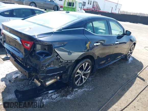 2016 Nissan Maxima SR with VIN 1N4AA6AP4GC419032, listed as a IAAI auction lot 41887138 with 164,208 mi miles and . Bid and sale history available at DreamBid. Image 4.