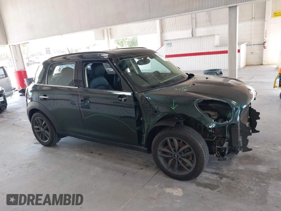 2013 MINI Countryman S with VIN WMWZC3C56DWP24170, listed as a IAAI auction lot 42366594 with 143,311 mi miles and . Bid and sale history available at DreamBid. Image 14.