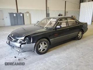 1996 Lexus ES 300 с VIN JT8BF12G9T0131227, выставлен на аукционе Copart как лот 85037274 с пробегом 410 997 миль миль и Списание • Salvage title. История ставок и продаж доступна на DreamBid. Изображение 1.