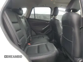 2016 Mazda CX-5 Grand Touring with VIN JM3KE2DYXG0839774, listed as a Copart auction lot 52336275 with 125,605 mi miles and Salvage Title. Bid and sale history available at carsss.com. Image 11.