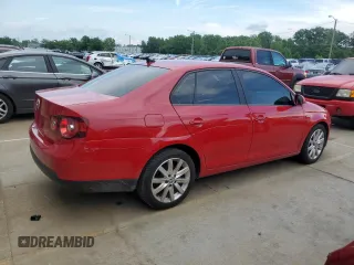 2010 Volkswagen Jetta Wolfsburg Edition with VIN 3VWRJ7AJXAM154666, listed as a Copart auction lot 60556875 with 149,509 mi miles and Salvage title. Bid and sale history available at DreamBid. Image 3.