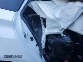 2021 Toyota Prius LE z VIN JTDL9MFU9M3022975, wystawiony jako Copart lot #53810615 z przebiegiem Nie podano mil oraz Nie do naprawy • Non repairable. Historia ofert i sprzedaży dostępna na DreamBid. Obrazek 13.