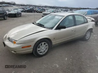 2001 Saturn SL z VIN 1G8ZK54791Z244243, wystawiony jako Copart lot #51078175 z przebiegiem 102 992 mil mil oraz Szkody całkowita. Historia ofert i sprzedaży dostępna na DreamBid. Obrazek 1.