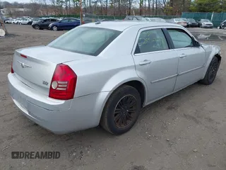 2009 Chrysler 300 Touring with VIN 2C3KA53V69H500462, listed as a IAAI auction lot 41896177 with 213,761 mi miles. Bid and sale history available at carsss.com. Image 4.