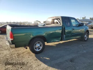 2000 Ford F-150 XL with VIN 1FTRX17W4YNB17453, listed as a Copart auction lot 52051215 with Not provided miles and Salvage title. Bid and sale history available at DreamBid. Image 3.