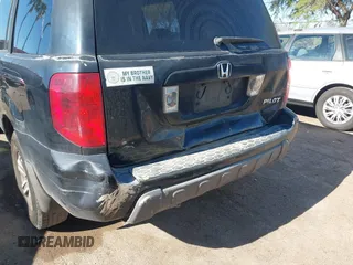2005 Honda Pilot EX with VIN 5FNYF18455B044034, listed as a IAAI auction lot 42078473 with 265,726 mi miles. Bid and sale history available at carsss.com. Image 6.