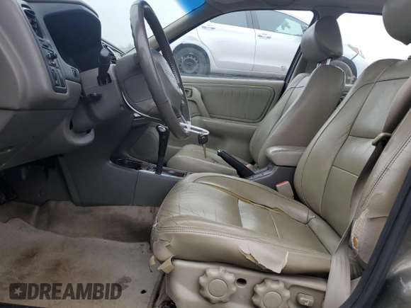 2000 Infiniti G20 Luxury z VIN JNKCP11A1YT304887, wystawiony jako Copart lot #74562724 z przebiegiem 202 140 mil mil oraz Czysty tytuł • Clean title. Historia ofert i sprzedaży dostępna na DreamBid. Obrazek 7.