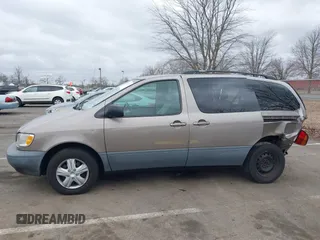 1999 Toyota Sienna LE with VIN 4T3ZF13C5XU121145, listed as a IAAI auction lot 41721171 with 229,760 mi miles and . Bid and sale history available at DreamBid. Image 14.