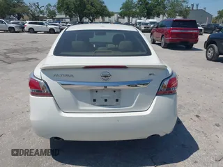 2015 Nissan Altima S with VIN 1N4AL3AP5FN405734, listed as a IAAI auction lot 42059082 with 90,651 mi miles and . Bid and sale history available at DreamBid. Image 16.