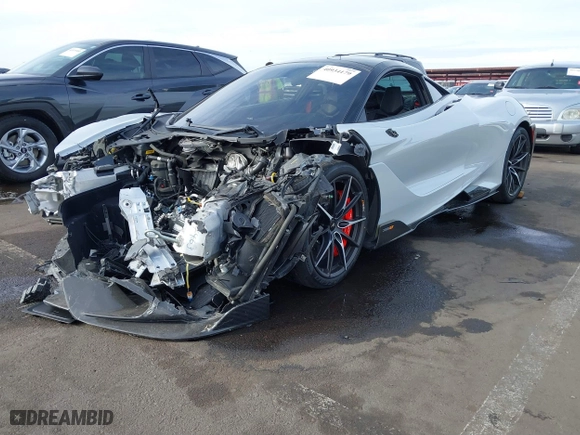2021 McLaren 765LT with VIN SBM14RCA3MW765344, listed as a IAAI auction lot 40934179 with 10,900 mi miles. Bid and sale history available at carsss.com. Image 2.