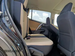 2018 Toyota RAV4 XLE with VIN 2T3WFREV2JW433186, listed as a Copart auction lot 61008705 with 57,310 mi miles and Salvage title. Bid and sale history available at DreamBid. Image 11.