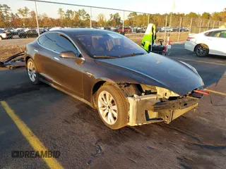 2013 Tesla Model S with VIN 5YJSA1CN7DFP22690, listed as a IAAI auction lot 40981089 with 188,057 mi miles. Bid and sale history available at carsss.com. Image 1.