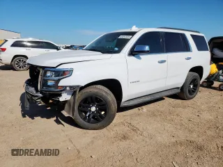 2016 Chevrolet Tahoe LS with VIN 1GNSCAKC6GR355149, listed as a Copart auction lot 60883305 with 179,782 mi miles and Salvage title. Bid and sale history available at DreamBid. Image 1.