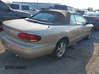 1999 Chrysler Sebring JXi z VIN 3C3EL55H0XT603685, wystawiony jako IAAI lot #42325316 z przebiegiem Nie podano mil oraz . Historia ofert i sprzedaży dostępna na DreamBid. Obrazek 4.