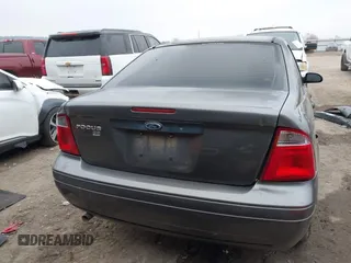 2007 Ford Focus S with VIN 1FAFP34NX7W158498, listed as a IAAI auction lot 41241970 with 119,933 mi miles and . Bid and sale history available at carsss.com. Image 17.