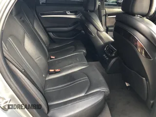 2012 Audi A8 с VIN WAUAVAFD2CN028862, выставлен на аукционе Copart как лот 80295204 с пробегом 162 752 миль миль и Чистый • Clean title. История ставок и продаж доступна на DreamBid. Изображение 6.