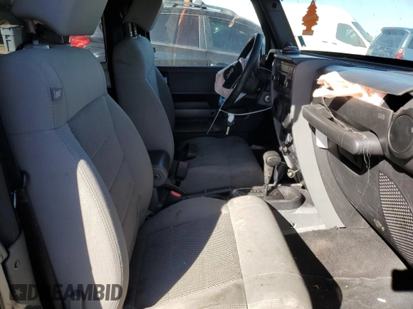 2008 Jeep Wrangler Sahara with VIN 1J4FA54108L625297, listed as a Copart auction lot 46832405 with 144,848 mi miles and Salvage title. Bid and sale history available at DreamBid. Image 7.