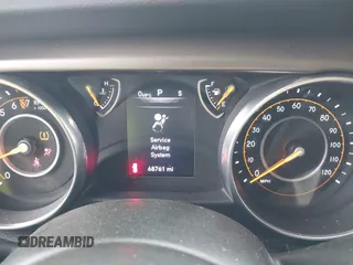 2018 Jeep Wrangler Sport S with VIN 1C4GJXAG0JW224562, listed as a IAAI auction lot 41327316 with 68,761 mi miles and . Bid and sale history available at DreamBid. Image 7.
