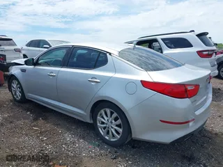 2014 Kia Optima EX with VIN 5XXGN4A79EG339431, listed as a IAAI auction lot 39792297 with 101,446 mi miles. Bid and sale history available at carsss.com. Image 3.