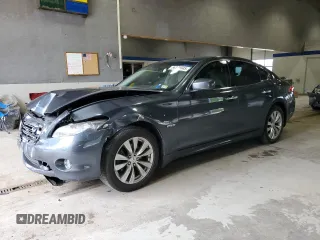 2012 Infiniti M Hybrid with VIN JN1EY1AP1CM910773, listed as a Copart auction lot 56379845 with 168,626 mi miles and Clean title. Bid and sale history available at DreamBid. Image 1.
