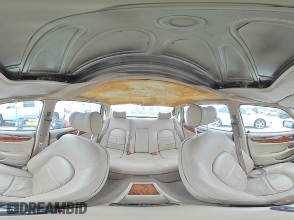 1999 Jaguar XJ z VIN SAJKD6043XC872105, wystawiony jako Copart lot #86270724 z przebiegiem Nie podano mil oraz Szkoda całkowita • Salvage title. Historia ofert i sprzedaży dostępna na DreamBid. Obrazek 13.