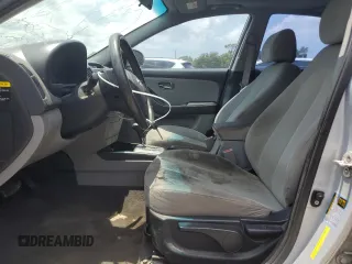 2010 Hyundai Elantra GLS with VIN KMHDU4AD4AU050694, listed as a Copart auction lot 57463205 with 125,228 mi miles and Salvage title. Bid and sale history available at DreamBid. Image 7.