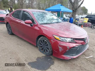 2020 Toyota Camry LE with VIN 4T1C11AK4LU920044, listed as a IAAI auction lot 42084112 with 96,745 mi miles and . Bid and sale history available at carsss.com. Image 1.