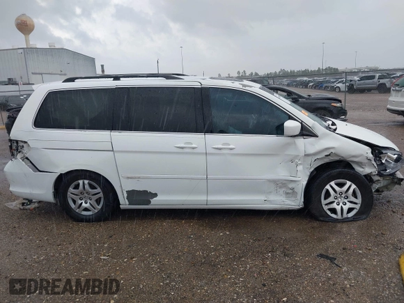 2007 Honda Odyssey EX-L z VIN 5FNRL38737B072789, wystawiony jako IAAI lot #41203148 z przebiegiem 156 828 mil mil oraz . Historia ofert i sprzedaży dostępna na DreamBid. Obrazek 12.