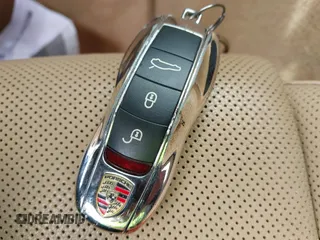 2013 Porsche Panamera 4S z VIN WP0AB2A71DL061108, wystawiony jako IAAI lot #42063281 z przebiegiem 90 100 mil mil oraz . Historia ofert i sprzedaży dostępna na DreamBid. Obrazek 11.