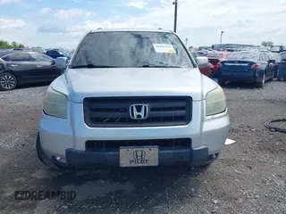 2006 Honda Pilot EX-L with VIN 2HKYF18596H563583, listed as a IAAI auction lot 42183326 with 181,665 mi miles and . Bid and sale history available at DreamBid. Image 12.