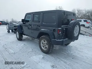 2016 Jeep Wrangler Unlimited Rubicon with VIN 1C4BJWFG7GL192698, listed as a IAAI auction lot 41603236 with 69,620 mi miles. Bid and sale history available at carsss.com. Image 3.
