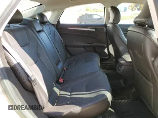 2016 Ford Fusion Titanium Hybrid with VIN 3FA6P0RU0GR153294, listed as a Copart auction lot 52723515 with 117,570 mi miles and Salvage title. Bid and sale history available at DreamBid. Image 10.