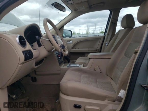 2005 Ford Freestyle SE z VIN 1FMZK011X5GA76053, wystawiony jako Copart lot #42416335 z przebiegiem 243 161 mil mil oraz Szkoda całkowita • Salvage title. Historia ofert i sprzedaży dostępna na DreamBid. Obrazek 7.