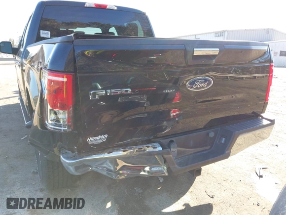 2015 Ford F-150 XLT with VIN 1FTEW1EG6FKF22211, listed as a IAAI auction lot 41753438 with 130,019 mi miles. Bid and sale history available at carsss.com. Image 6.