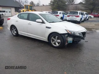 2015 Kia Optima LX with VIN KNAGM4A70F5571034, listed as a IAAI auction lot 41734211 with 214,948 mi miles. Bid and sale history available at carsss.com. Image 1.
