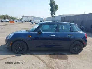 2015 MINI Hardtop 4 Door with VIN WMWXS5C50FT830060, listed as a IAAI auction lot 42744826 with 99,813 mi miles and . Bid and sale history available at DreamBid. Image 14.