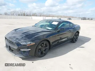 2021 Ford Mustang EcoBoost z VIN 1FA6P8TH2M5140071, wystawiony jako IAAI lot #41775674 z przebiegiem 20 184 mil mil oraz . Historia ofert i sprzedaży dostępna na DreamBid. Obrazek 17.