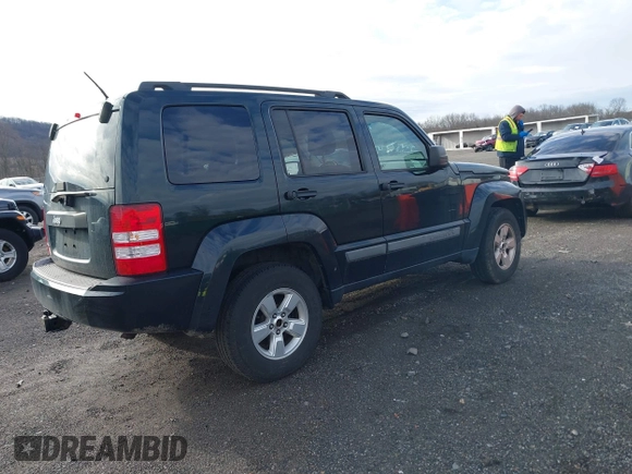 2012 Jeep Liberty Sport with VIN 1C4PJMAKXCW153053, listed as a IAAI auction lot 41728329 with 81,866 mi miles and . Bid and sale history available at DreamBid. Image 4.