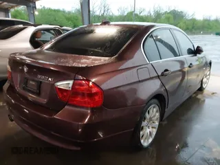 2006 BMW 3 Series 330xi with VIN WBAVD33526KV59403, listed as a IAAI auction lot 41908734 with 136,349 mi miles. Bid and sale history available at carsss.com. Image 4.