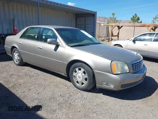 2003 Cadillac DeVille with VIN 1G6KD54Y43U136688, listed as a IAAI auction lot 41860719 with 124,230 mi miles. Bid and sale history available at carsss.com. Image 1.