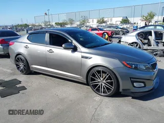 2015 Kia Optima SX Turbo with VIN 5XXGR4A64FG448666, listed as a IAAI auction lot 42564879 with 151,903 mi miles and . Bid and sale history available at DreamBid. Image 1.