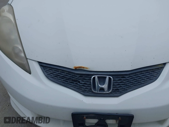 2011 Honda Fit Sport z VIN JHMGE8H51BC016707, wystawiony jako IAAI lot #42341893 z przebiegiem 326 759 mil mil oraz . Historia ofert i sprzedaży dostępna na DreamBid. Obrazek 6.